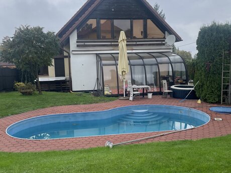 Prodej rodinného domu s garáží, zimní zahradou a bazénem na ulici Palkovická ve Frýdku Místku